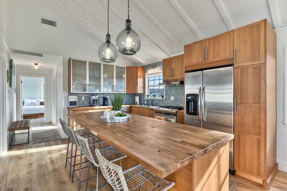 Full kitchen with seating for late night snacks or quick breakfasts