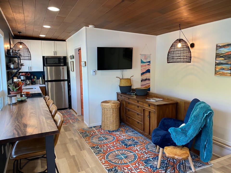 Counter seating will lake views, 2nd bedroom opposite kitchen sink (orange door)