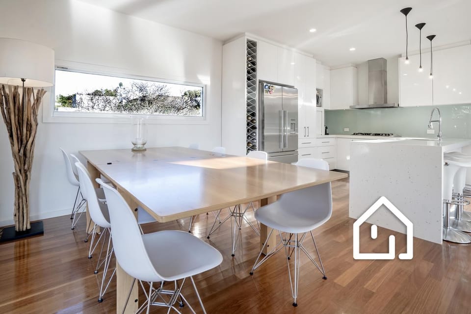 Dining table with seating for 8 (bar stools can be lowered for extra seating)