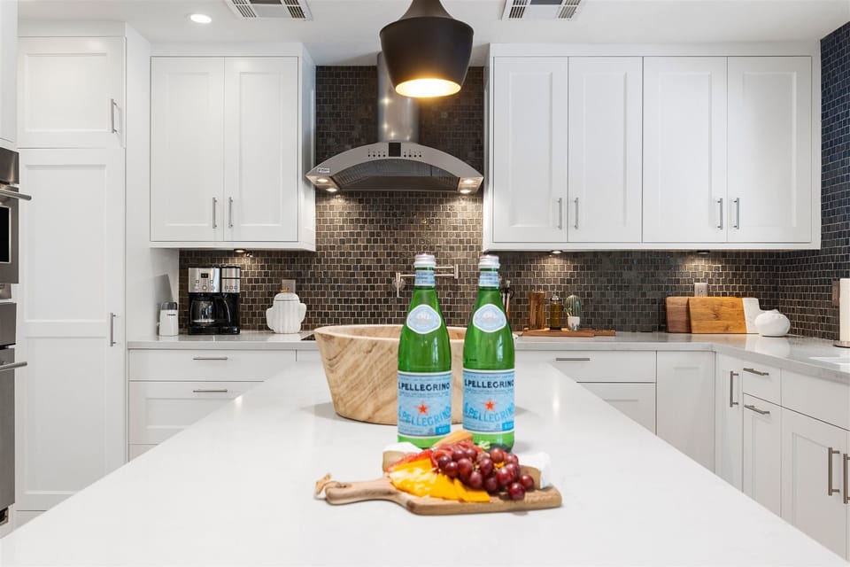 Light and bright and clean chefs kitchen.