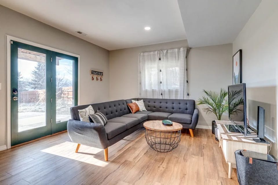 Main living area. We also added sheer and blackout curtains to the glass doors.