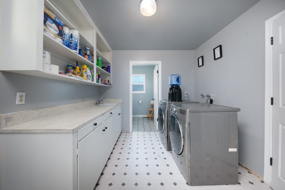 Laundry Room and entry to 3rd Bathroom
