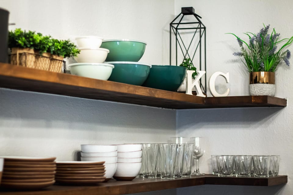 Shelving and glassware in the 3-bedroom flat's newly remodeled kitchen