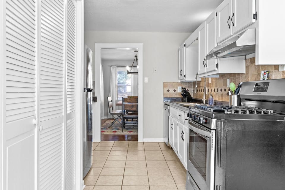 Convenient layout connecting the kitchen to dining and living areas, making it easy to cook, dine, and entertain during your Kansas City visit.