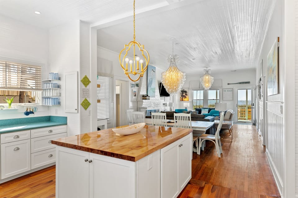 Beautiful kitchen island keeps you connected to friends and family!