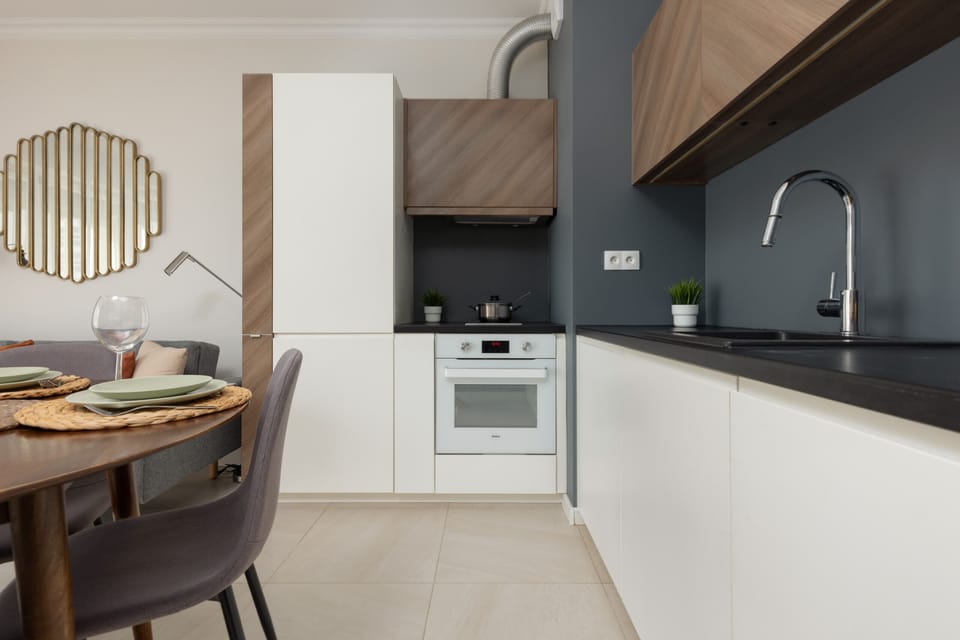 The fully equipped kitchenette includes everything you need for a home-cooked meal.