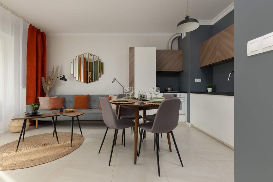 The living room's sleek design is both functional and aesthetically pleasing.