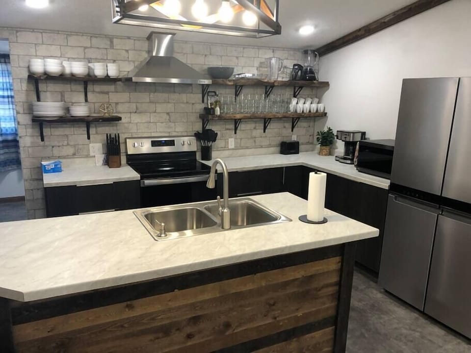 Open shelves in a well stocked Kitchen