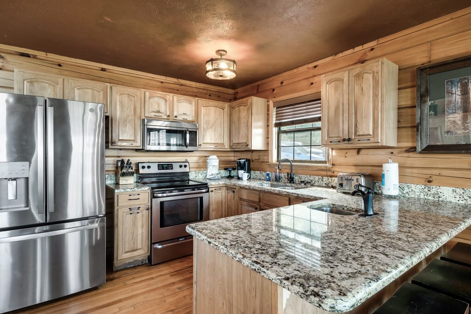 Our gourmet kitchen with an island that sits 4. 