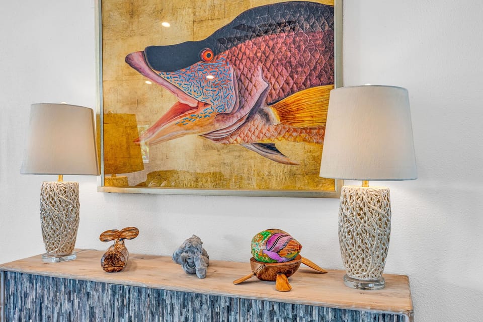 Desk with 2 lamps and artwork