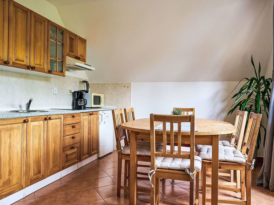 Cabinetry, Furniture, Property, Countertop, Wood, Chair, Sink, Kitchen Appliance, Lighting, Interior Design