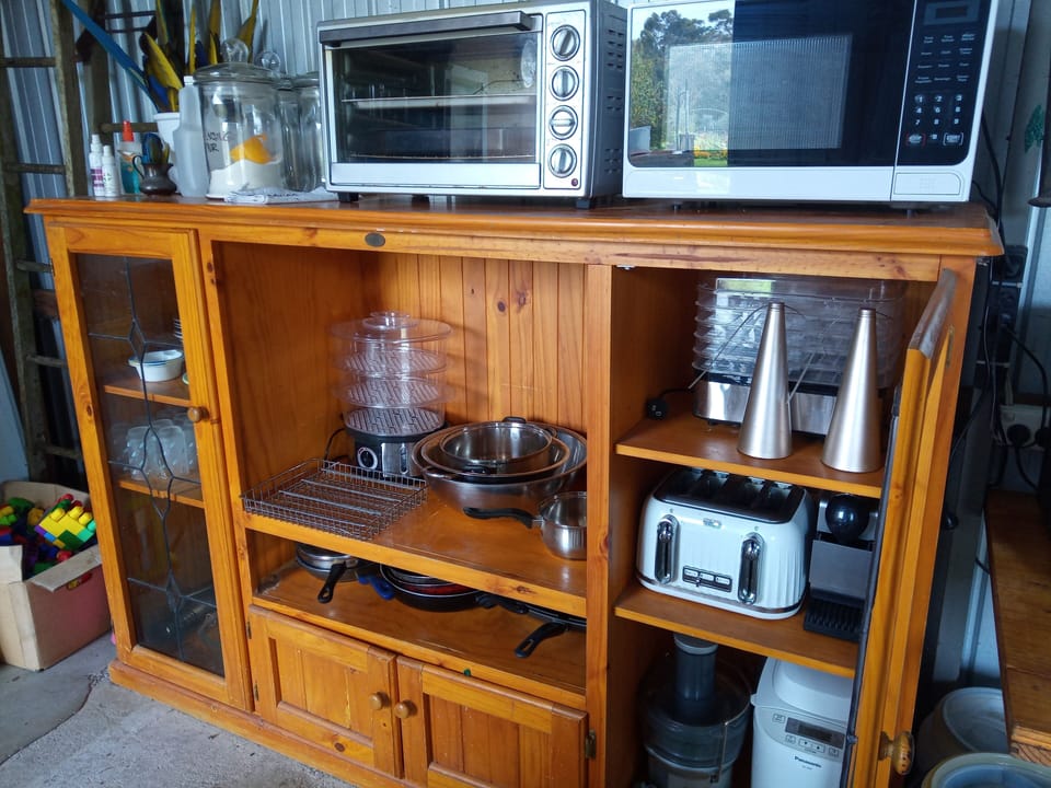 Camp kitchen microwave, full stove and oven, full size fridge, juicer and more