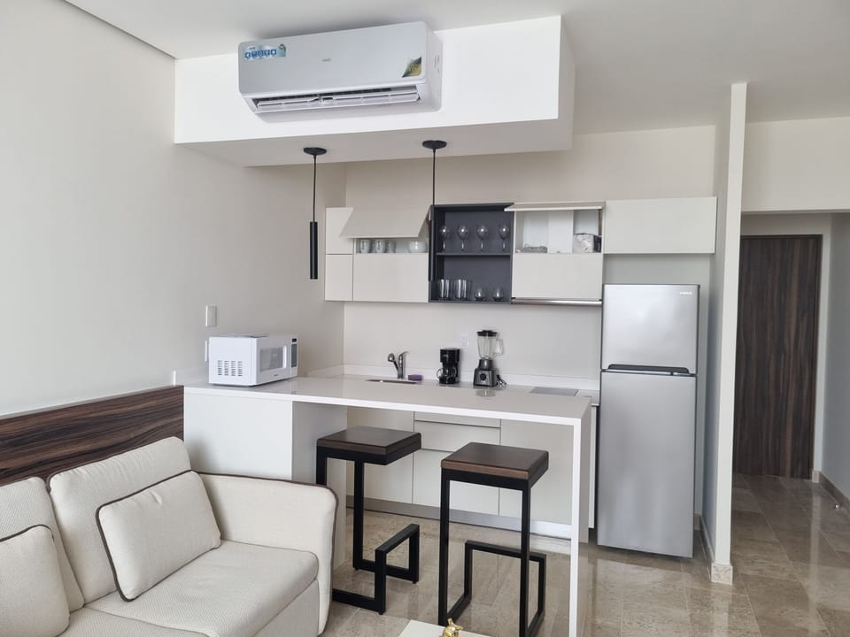 air-conditioner-fridge-microwave-kitchenette