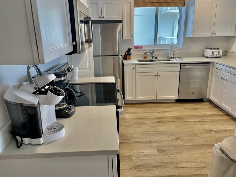 We have a standard coffee maker and a Keurig for you to use!