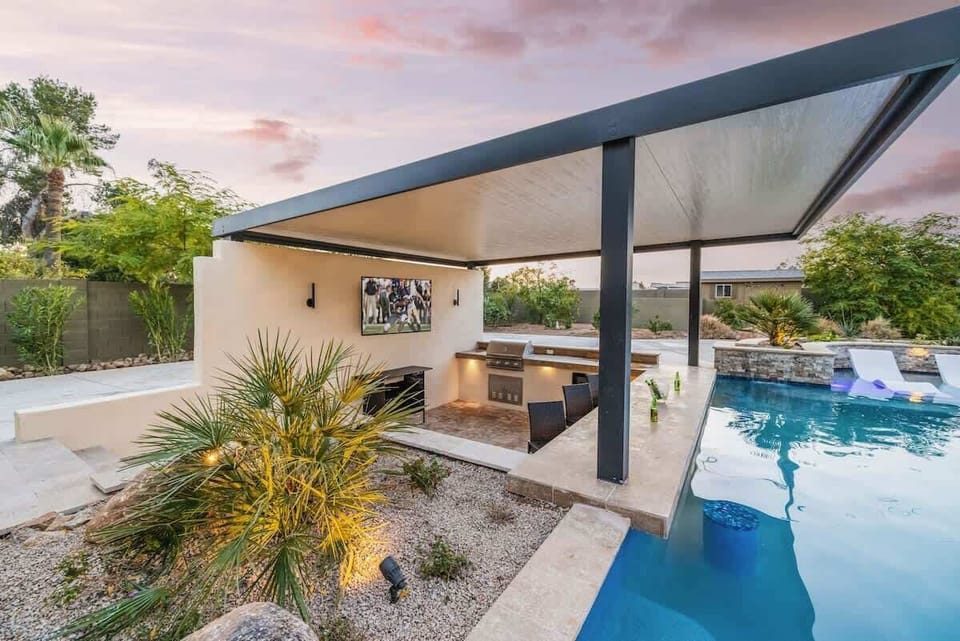 Imagine poolside moments, drinks, and big-screen fun under desert skies.