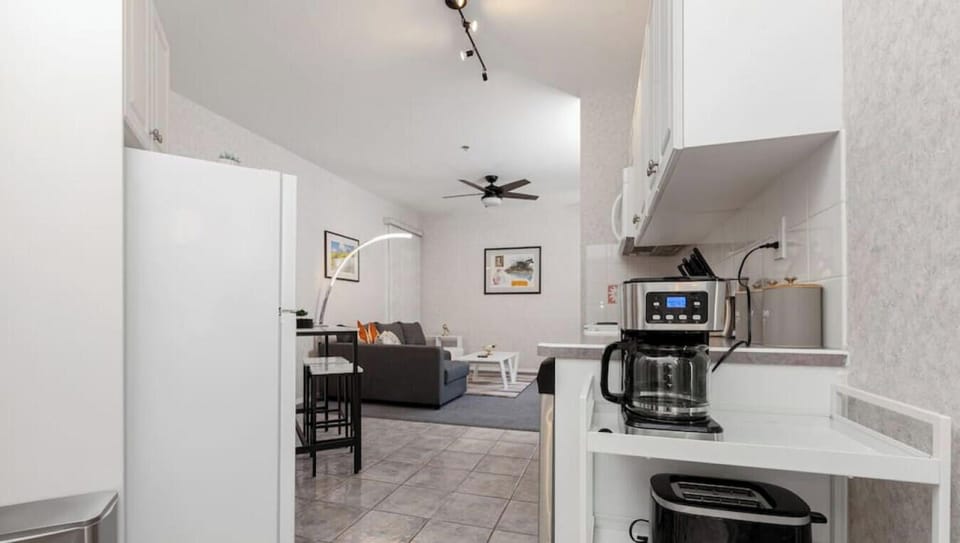 Kitchenette with a drip coffee machine, ground coffee, tea, sugar and basic condiments (ketchup, mustard and relish.) Please note that this unit does not have a conventional oven.