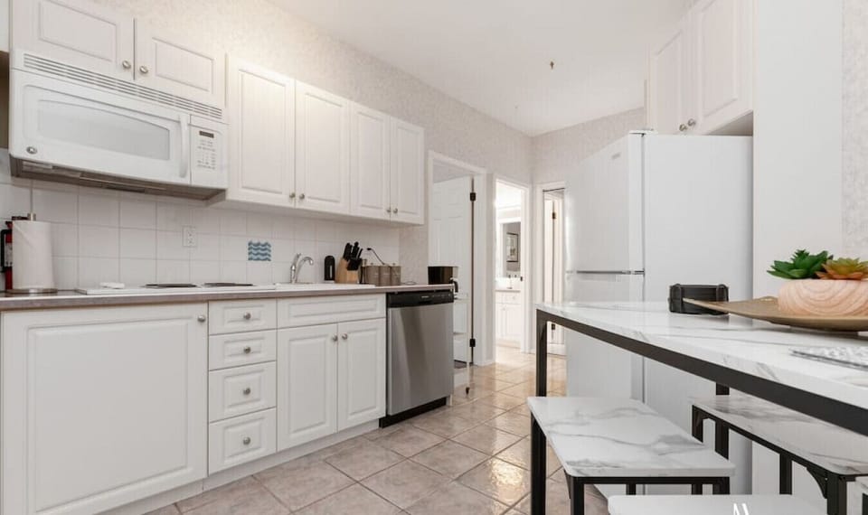 Kitchenette with a drip coffee machine, ground coffee, tea, sugar and basic condiments (ketchup, mustard and relish.) Please note that this unit does not have a conventional oven.