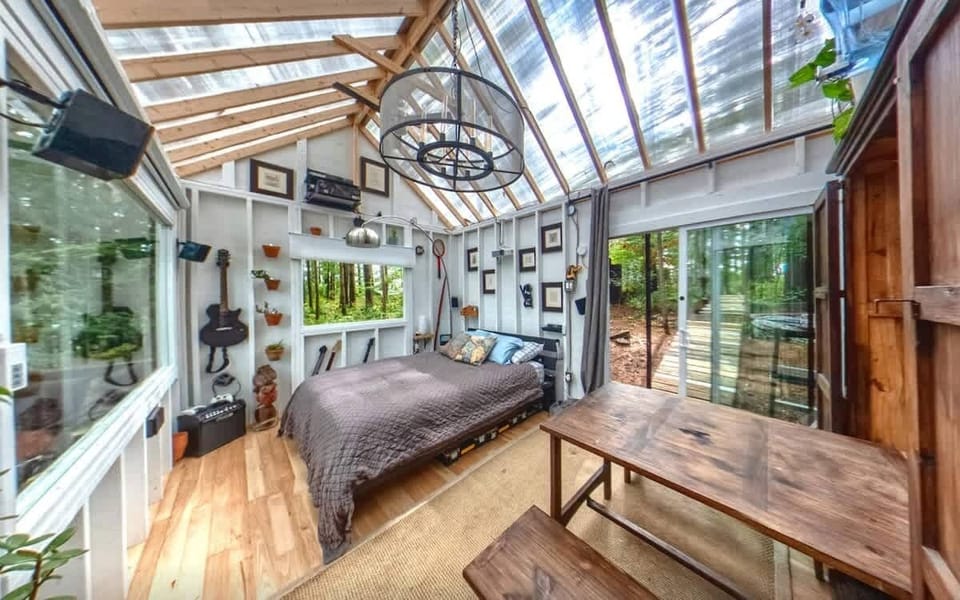 The Stabbin Cabin #2
Sun-drenched and adorned with Restoration Hardware furniture. a comfy bed with an electric blanket.
Press the button to drop down the motorized movie screen over the front window and enjoy a cinematic, surround sound, experience