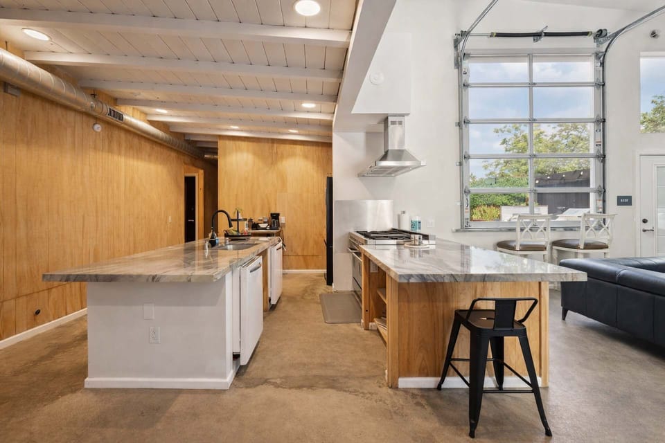 Kitchen: Two islands and 48 inch gas, cooktop and oven. ADA accessible. Stocked with all utensils plates pans. Starter coffee and machine included.