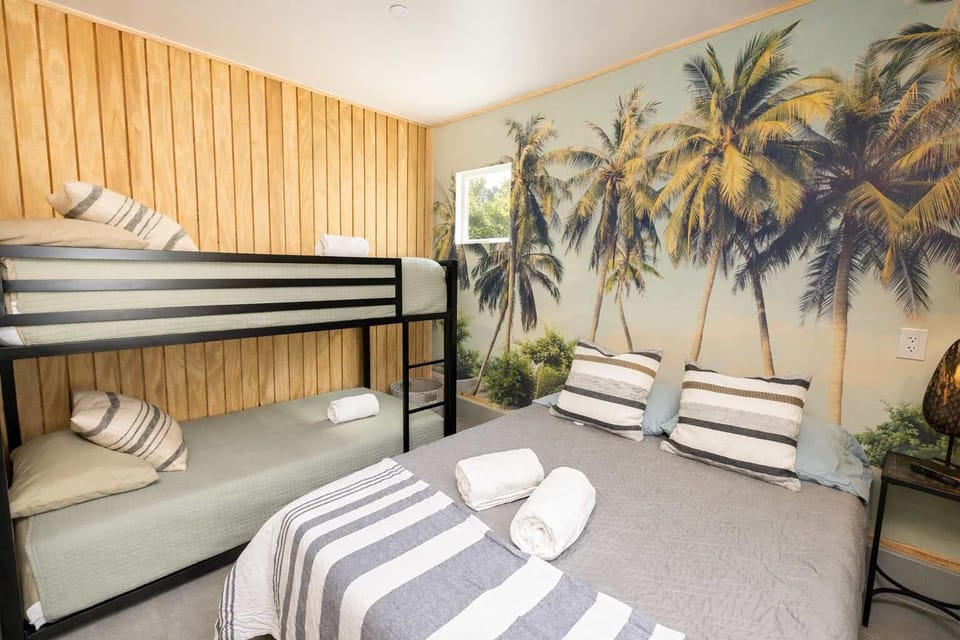 Light-Filled Bunk Bedroom with Playful, Tropical Touches