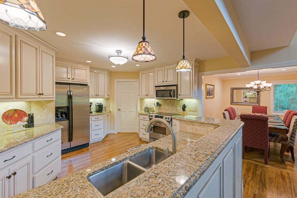 Fully Equipped Kitchen with Granite Countertops & Stainless Steel Appliances