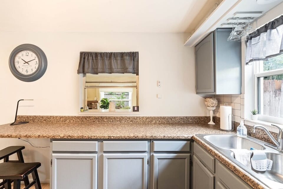 Spacious countertop perfect for food preparation and casual dining.