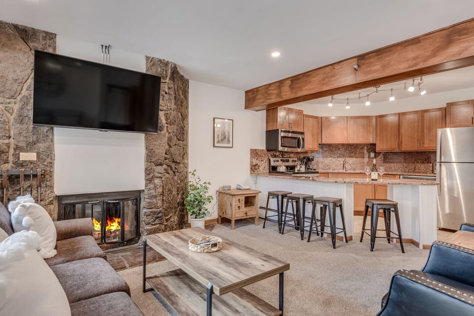 Living area with wood-burning fireplace