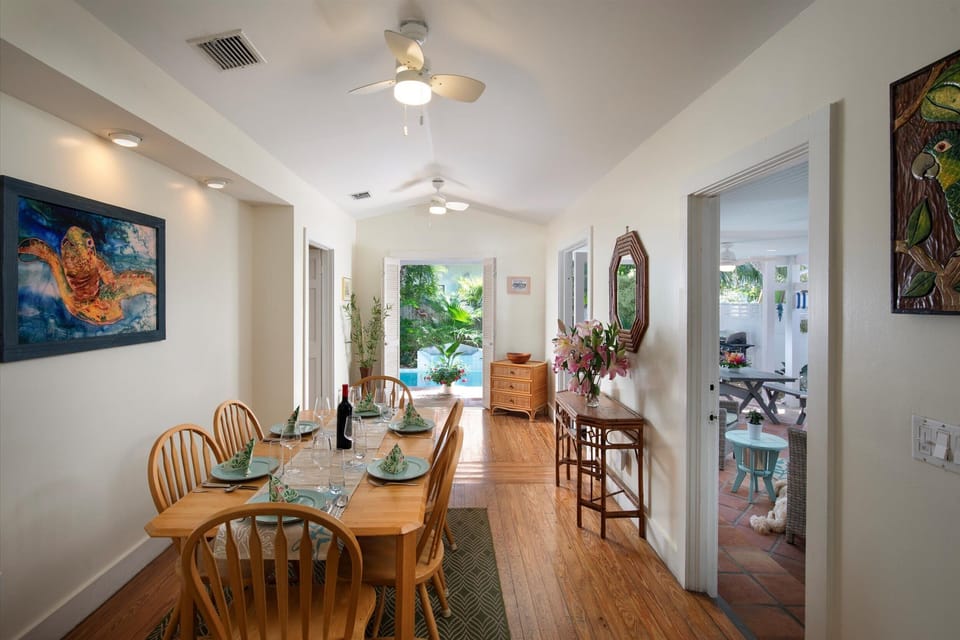 Dining Room that leads out to outside sitting area and pool