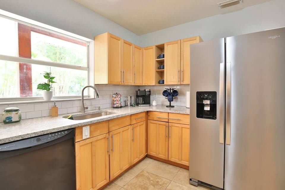 This kitchen has everything you'll need, including a deluxe coffee maker with coffee and tea selections. Stainless steel appliances, and refrigerator with water dispenser and ice maker for your convenience.