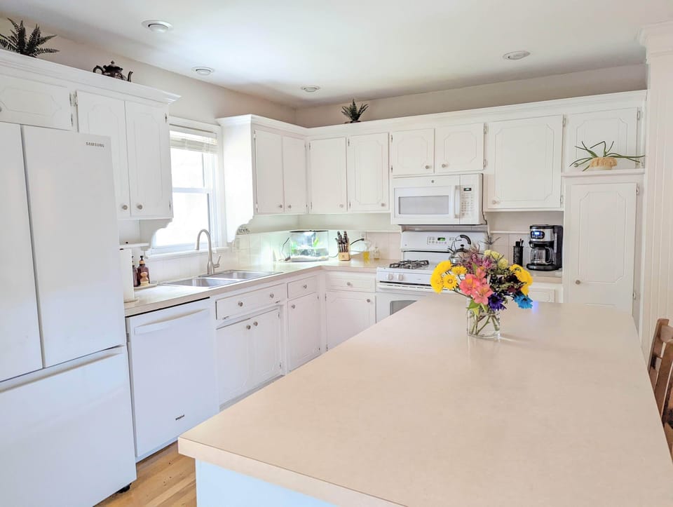 Open kitchen and dining room makes it easy for large groups.
