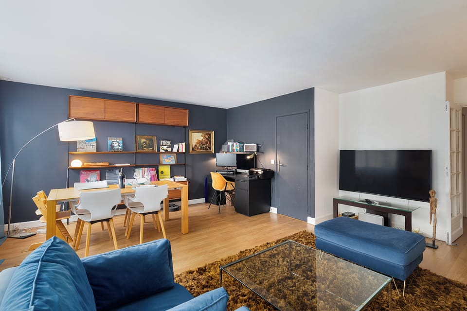 Open-plan living and dining area with modern decor.