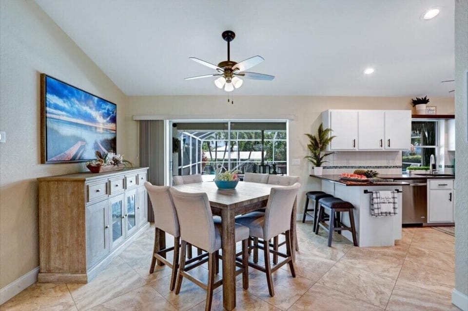 Open concept dining with natural light and modern design