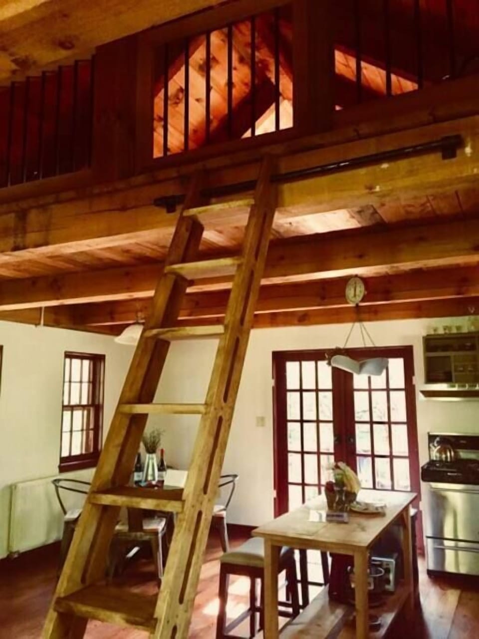 Ladder up to guest loft with latch gate