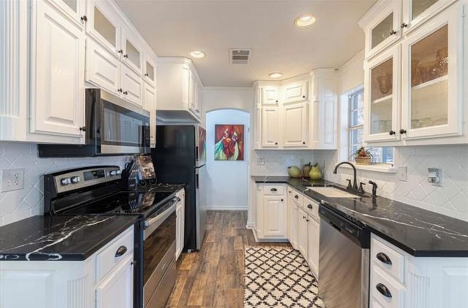 The kitchen.  Hidden in the back of the kitchen is the coffee and tea center