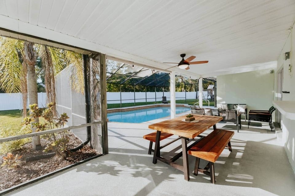 Dining setup on the screened-in veranda 