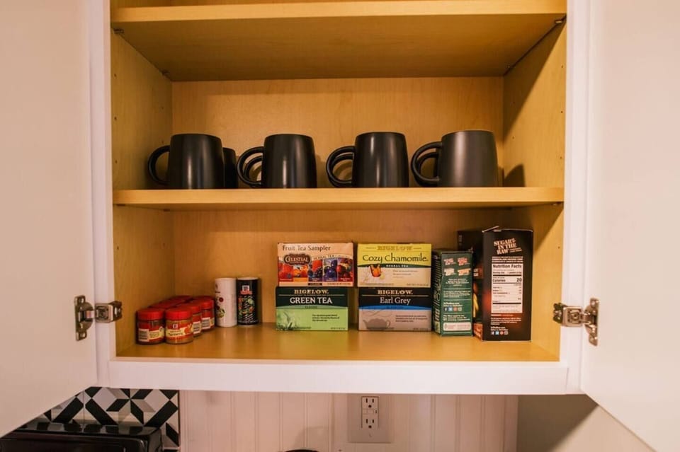 In addition to our coffee bar, we provide a selection of teas, as well as salt, pepper, and other assorted spices. It's the little touches that make this home so convenient for our guests.