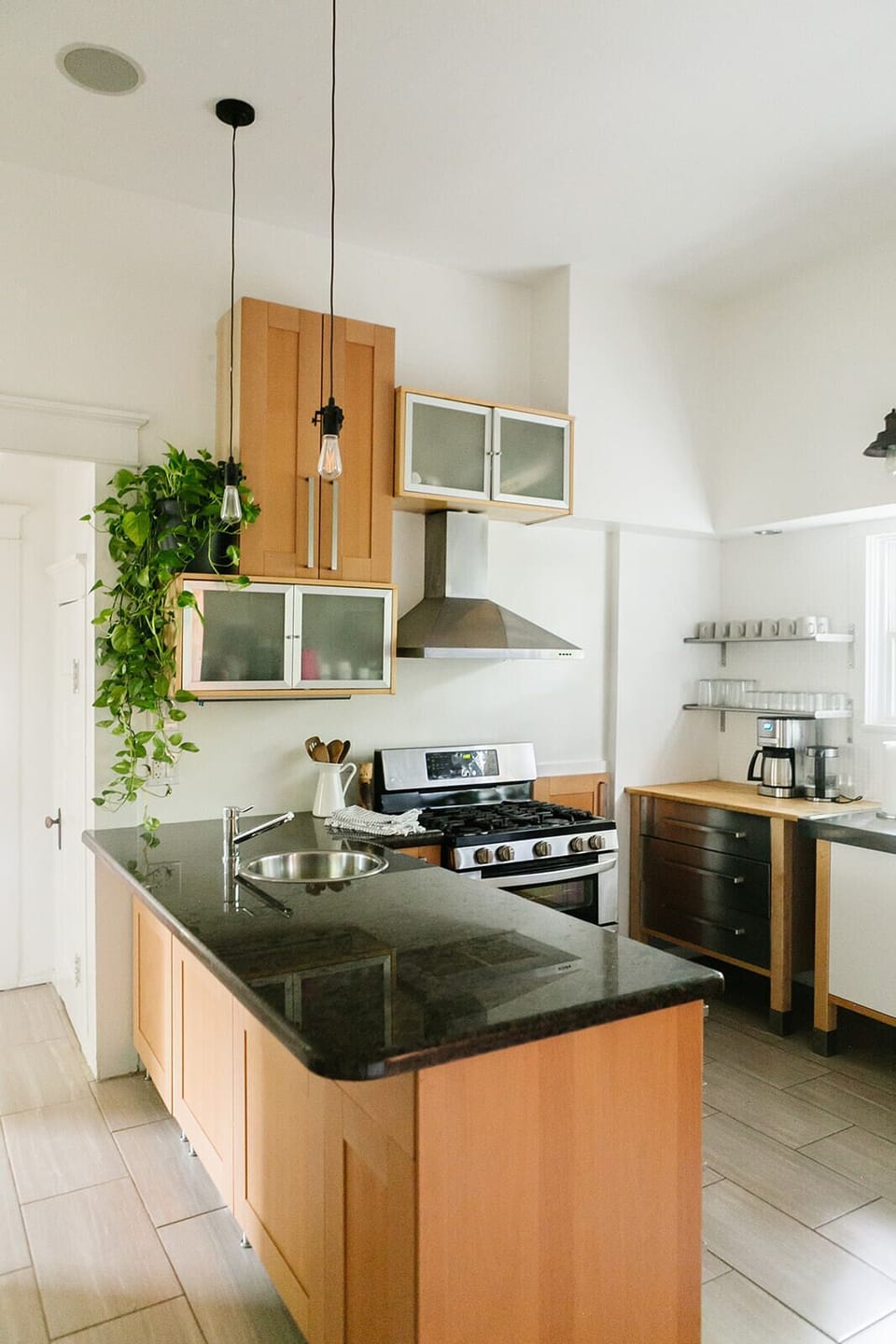 Walk back through fully stocked kitchen with gas range, microwave & dishwasher.