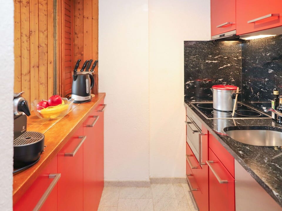 Kitchen Sink, Cabinetry, Property, Countertop, Sink, Interior Design, Kitchen Appliance, Kitchen, Kitchen Stove, Orange