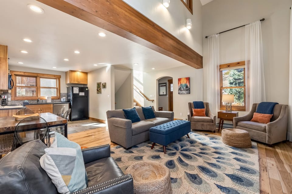 Living room with kitchen in background