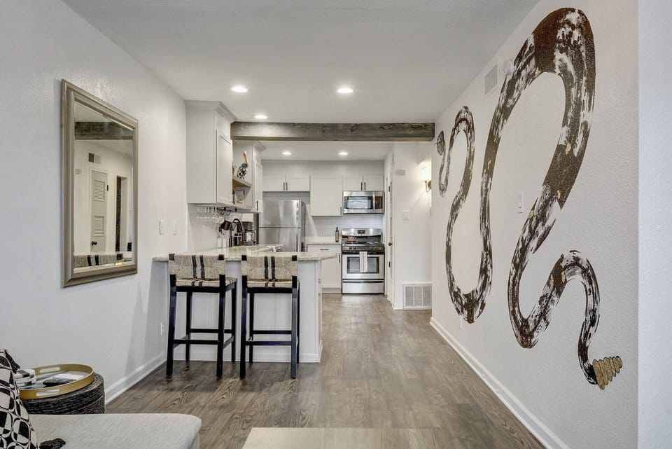 Living room leads into open concept kitchen