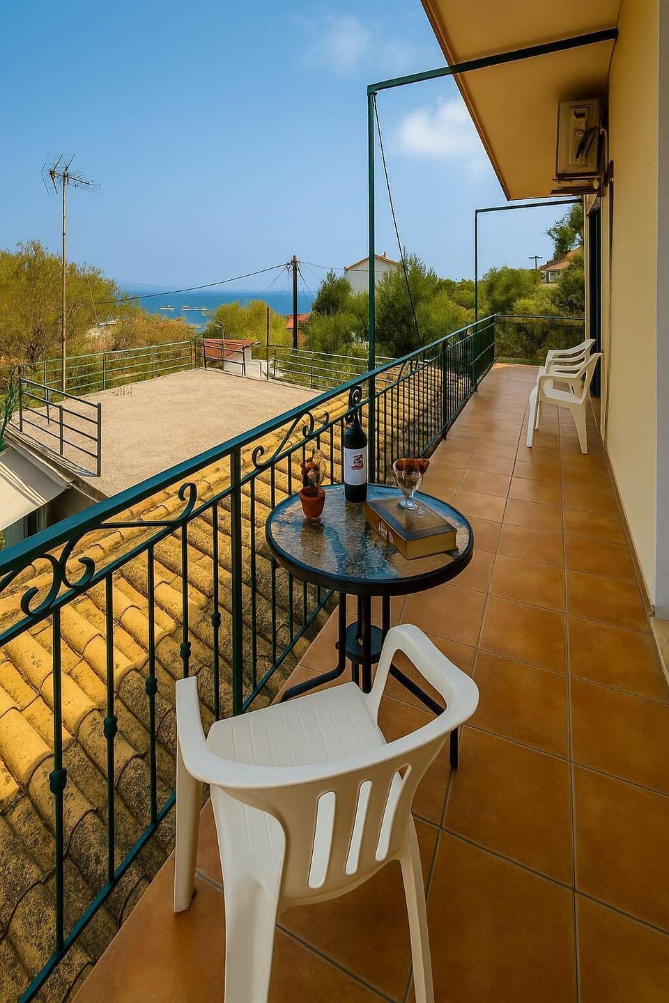 Balcony with Elevated Views – Outdoor seating area with open views of the property’s surroundings, ideal for enjoying morning coffee or evening sunsets.