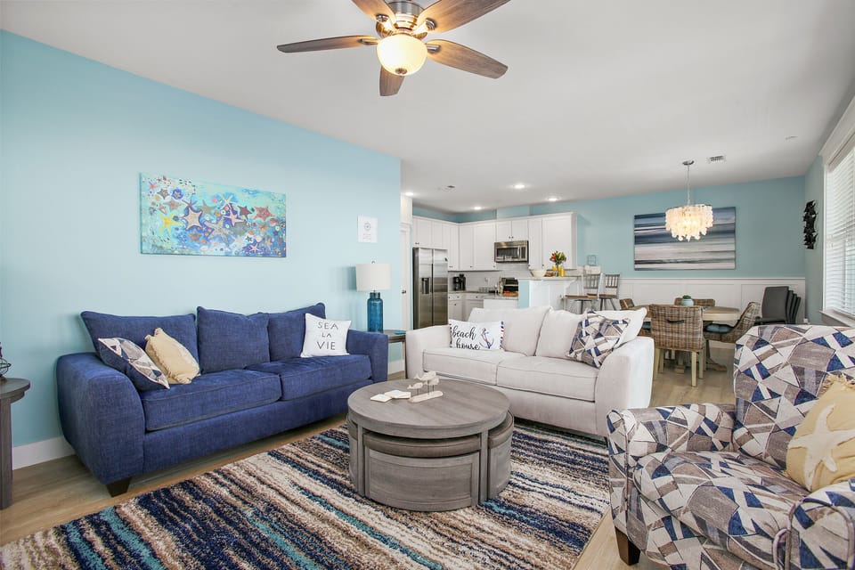 Spacious open floor plan with ocean views from living, dining & kitchen.