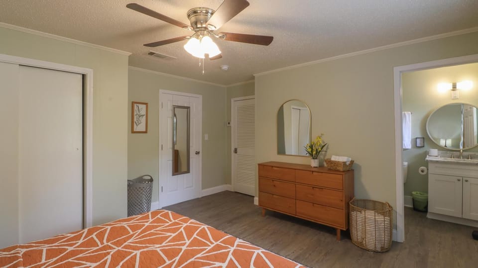 Sleep soundly on a king bed. Queen air mattress is located in the closet.