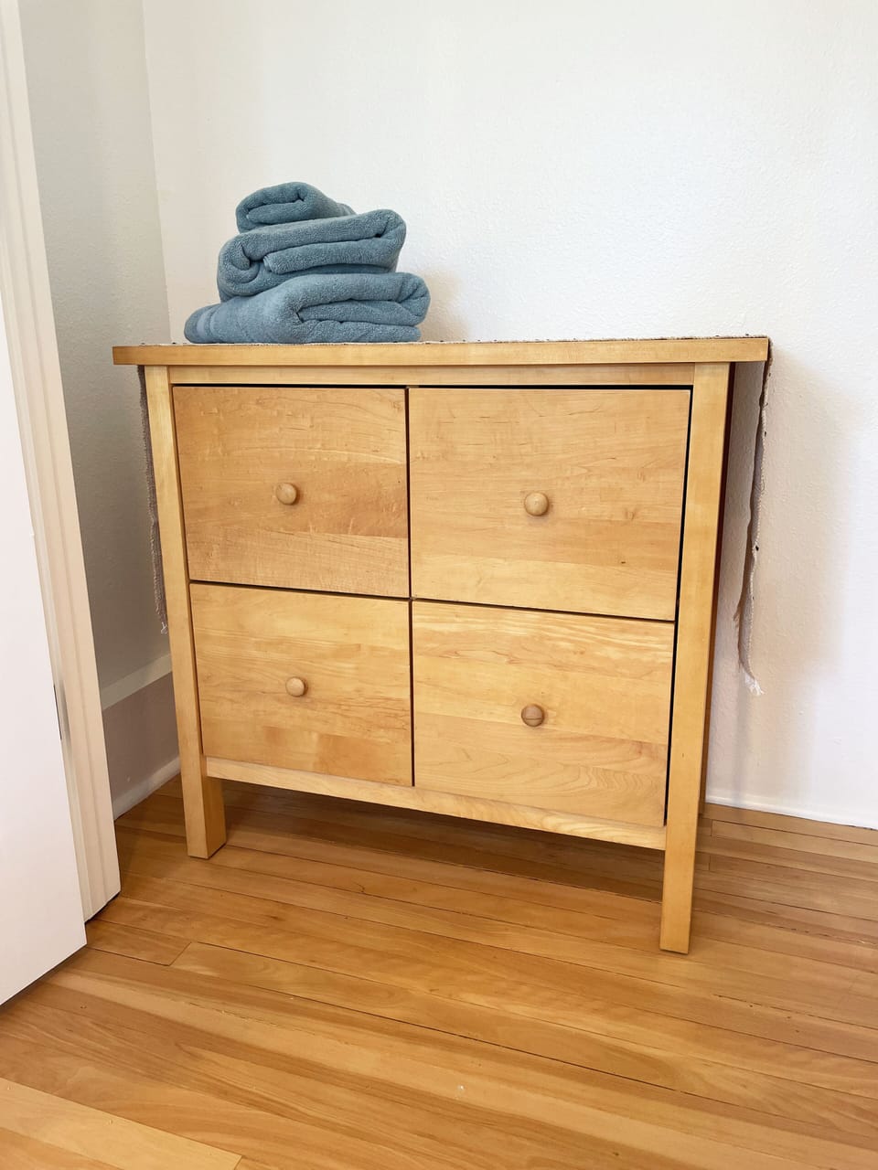 Each bedroom has a dresser in the closet