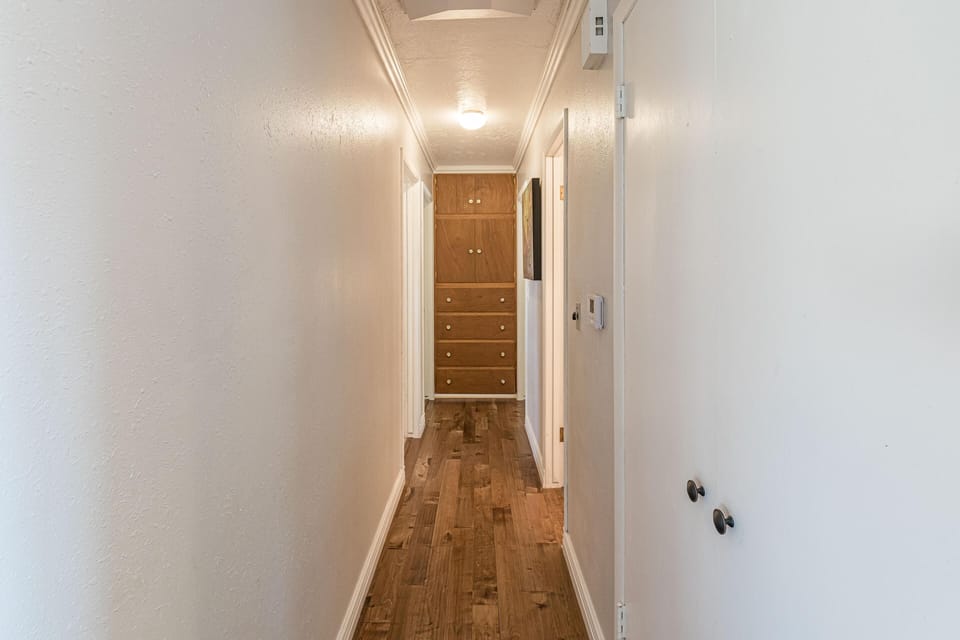 Hallway to bedrooms and common bathroom
