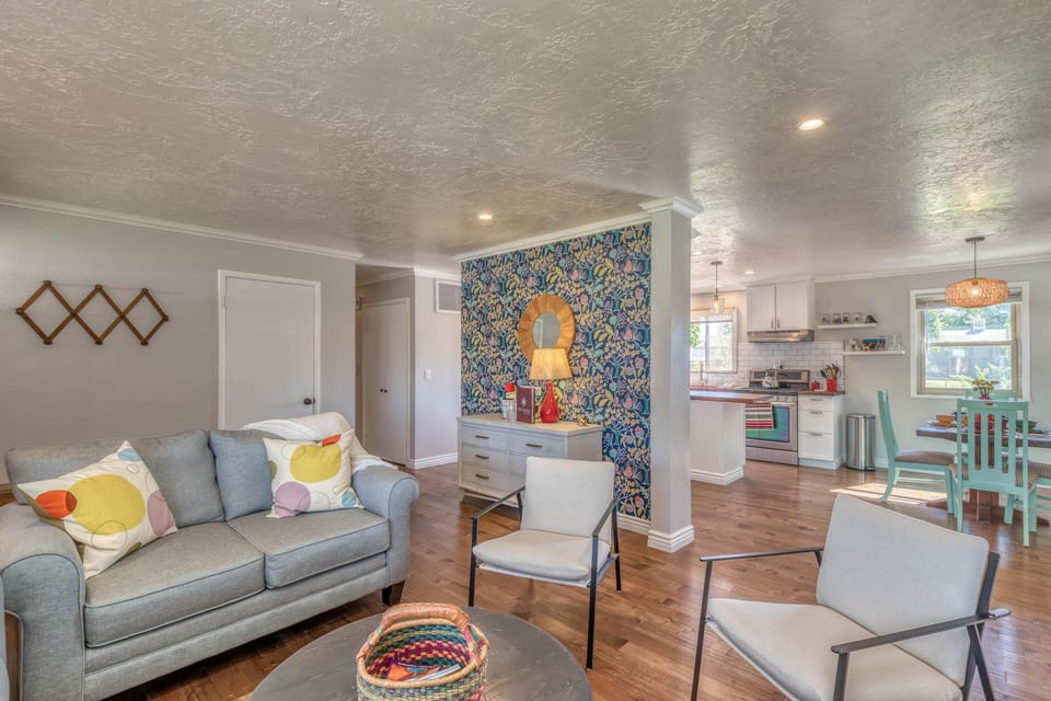 A bright and inviting living room, perfect for relaxing after a day of adventure.