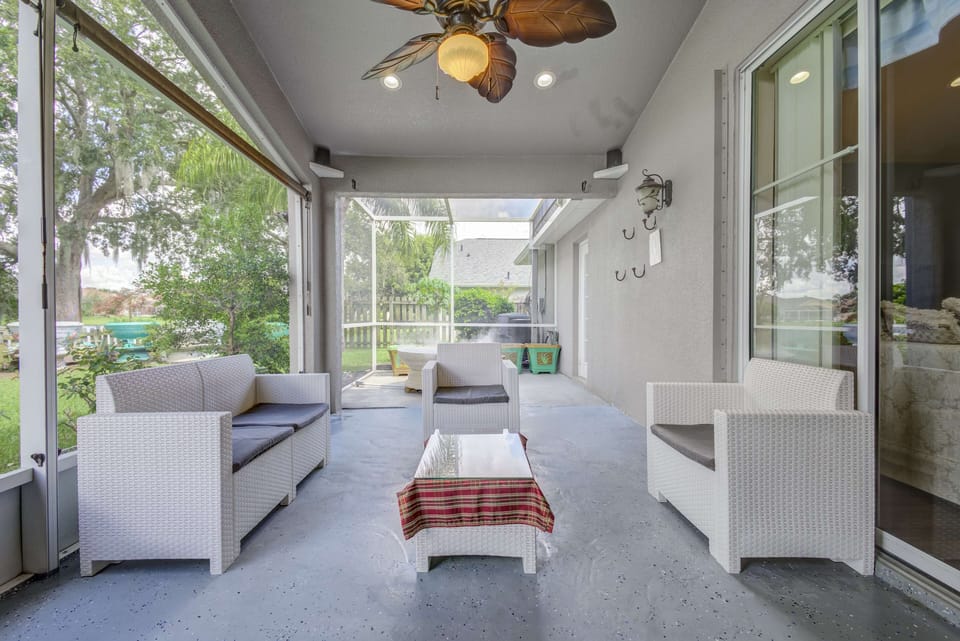 Comfortable chairs, table on the patio.