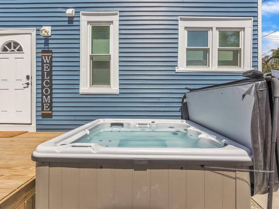 Relax in the hot tub that is one of the top features at Big Blue. Enjoy the convenience of keyless entry at the door shown at left.