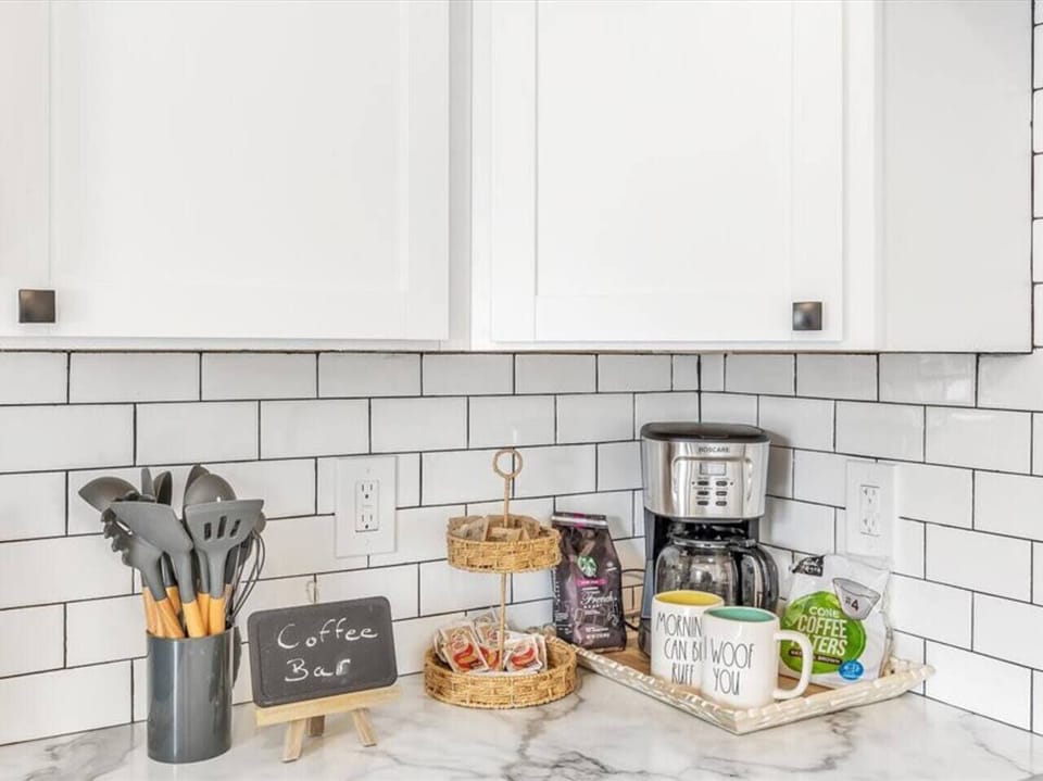 Find an array of cooking utensils on the counter.