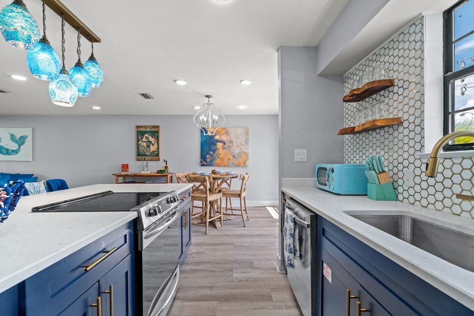 The kitchen has been beautifully updated with new appliances and special details to ensure your stay is amazing